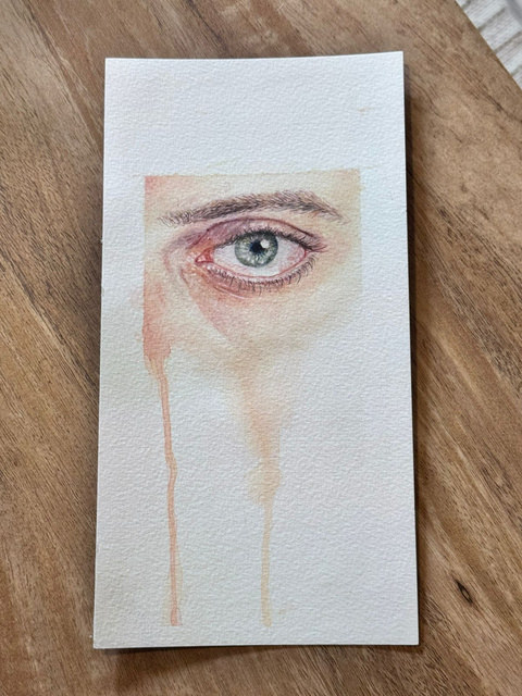 Desvanecer — acuarela de un ojo con escurridos de pintura